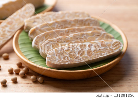 Tempeh made from fermented soybeans, Traditional Indonesian food, Healthy vegan and plant based Tempeh made from fermented soybeans, Traditional Indonesian food, Healthy vegan and plant based 131891850