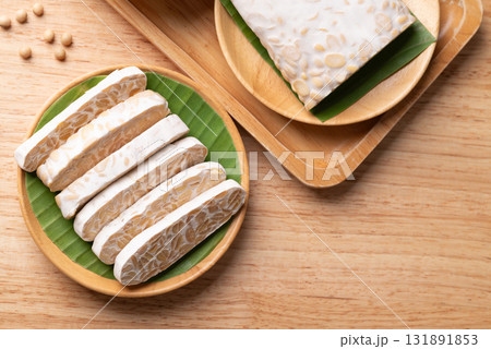Tempeh made from fermented soybeans, Traditional Indonesian food, Healthy vegan and plant based Tempeh made from fermented soybeans, Traditional Indonesian food, Healthy vegan and plant based 131891853