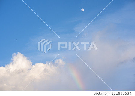 nature and landscape concept with cloudy sky wit rainbow and moon in raining season nature and landscape concept with cloudy sky wit rainbow and moon in raining season 131893534