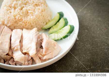 Hainanese chicken rice or rice steamed with chicken soup Hainanese chicken rice or rice steamed with chicken soup 131894306