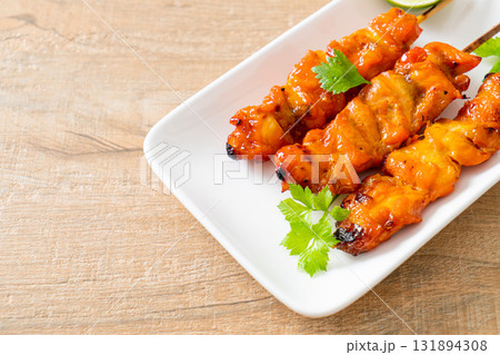 grilled chicken skewer with herbs and spices 131894308