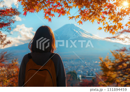 Back view of happy woman traveler enjoying in mountain Fuji view in bright day, Japan travel vacation, Freedom 131894459