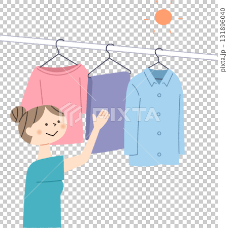 A woman hanging up the laundry 131896040