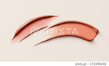 Smooth brush strokes of peach makeup foundation on light background 131896208