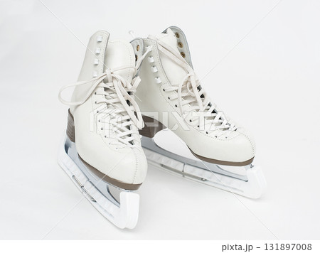 Skates in a cover on a white isolated background Skates in a cover on a white isolated background 131897008