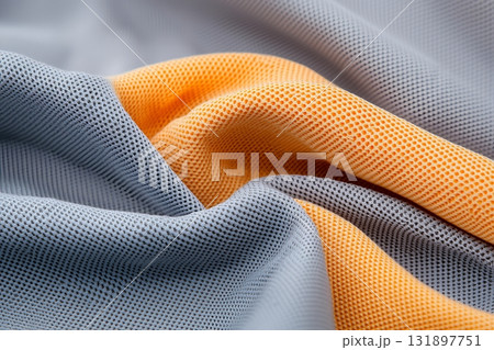 Close-Up of Textured Fabric with Gray and Orange Color Combination for Design Projects Close-Up of Textured Fabric with Gray and Orange Color Combination for Design Projects 131897751