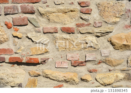 Rustic Stone Brick Wall 131898345
