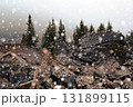 Snowing at the unique formation with boulder rocks in mountains in fall. 131899115