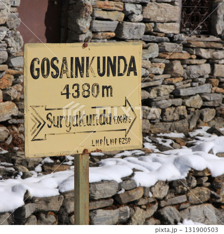 Directional sign in Gosainkunda, Nepal. 131900503