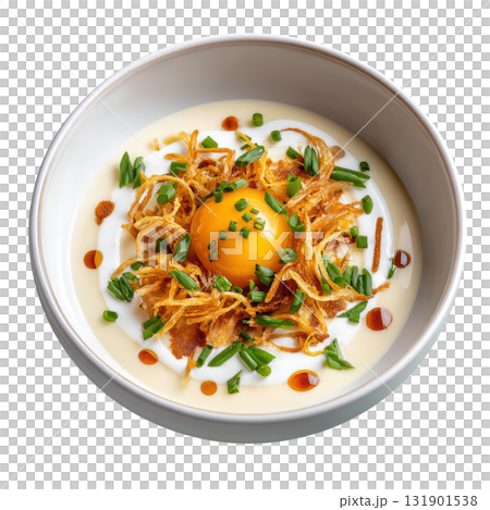 Silky Leek and Potato Veloute Soup with Crispy Leek Threads and Quenelle of Sour Cream in Shallow Bowl 131901538