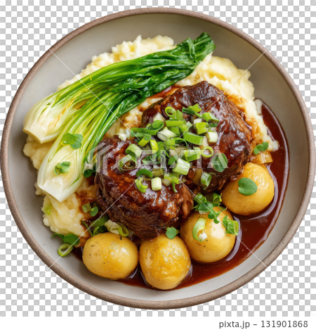 Tender Braised Veal Cheek with Madeira Glaze Served on Creamy Celery Root Mash and Roasted Green Onions 131901868