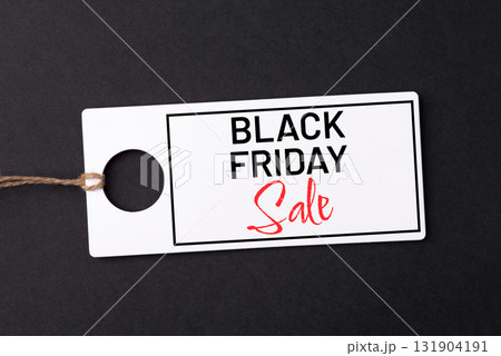 Black Friday tag on black background 131904191