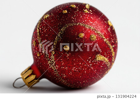 red Christmas ornament ball with golden glitter, isolated on white background 131904224