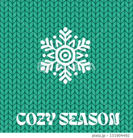 White snowflake on green knit pattern background with cozy season text for winter holiday greeting and warm seasonal design White snowflake on green knit pattern background with cozy season text for winter holiday greeting and warm seasonal design 131904492