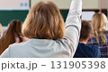 Back view of older student raising his hand to answer teacher's question during education training class. jpg ai image 131905398