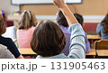 Back view of older student raising his hand to answer teacher's question during education training class. jpg ai image 131905463