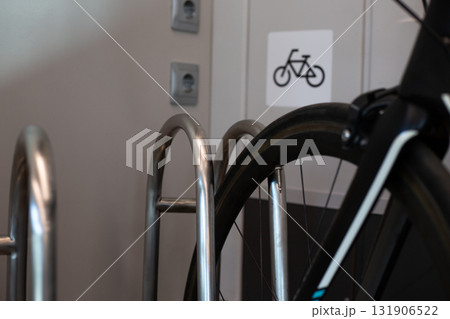 Designated space in city train for convenient transport of bicycles, designed for cyclists to store their bikes securely and travel comfortably 131906522