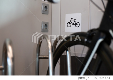 Close up image of bicycle placed in bike rack...の写真素材 [131906523] - PIXTA