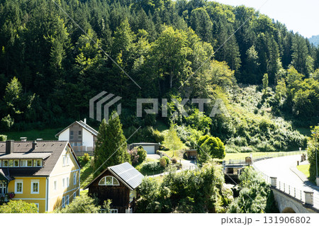 Austrian village in the mountains, beautiful views of the Alps Austrian village in the mountains, beautiful views of the Alps 131906802