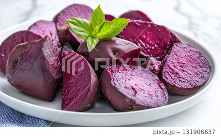 Purple sweet potato steam slice on white plate vegetable root farm Purple sweet potato steam slice on white plate vegetable root farm 131906837