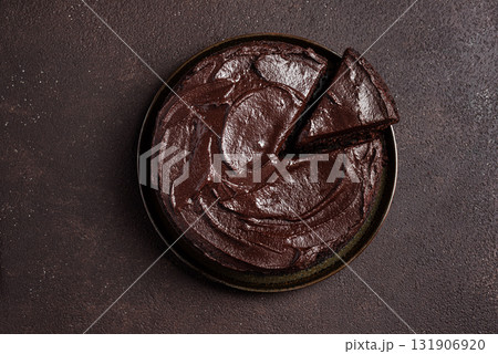 Chocolate brownie cake with rich chocolate topping 131906920