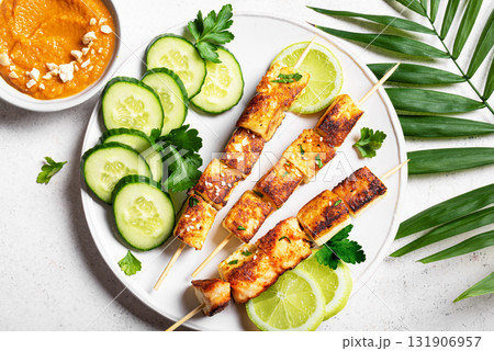 Grilled tofu satay skewers and peanut spicy sauce 131906957