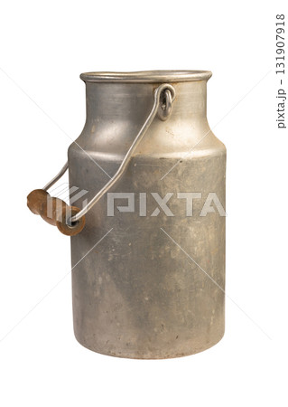 old metal milk can with wooden handle isolated on white background. farmhouse decoration or rustic storage. aluminum can 131907918