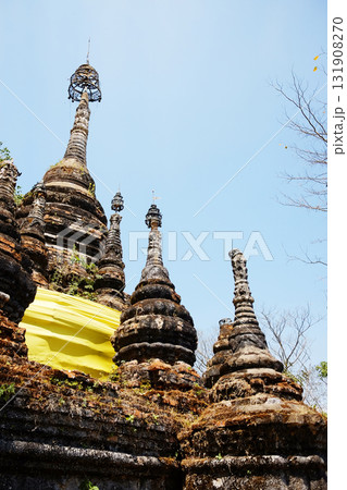 Ancient old pagoda symbols of buddhism in blue sky at Chiang doa temple in chiangmai of Thailand Ancient old pagoda symbols of buddhism in blue sky at Chiang doa temple in chiangmai of Thailand 131908270