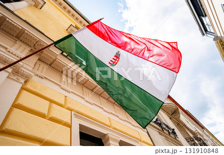 Hungarian National Flag Waving On A Facade 131910848