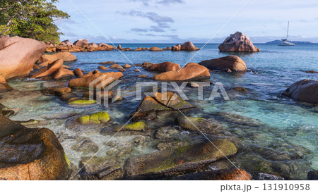 Coastal rocks of Anse Lazio beach on a sunny day. Seychelles 131910958