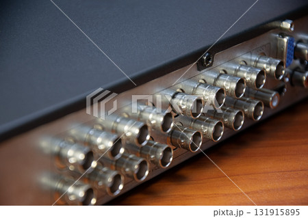 Rear view of the CCTV recorder, with various connection ports. Rear view of the CCTV recorder, with various connection ports. 131915895