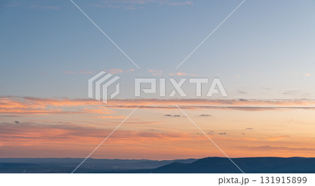 Beautiful colorful sunset sky over mountain horizon 131915899