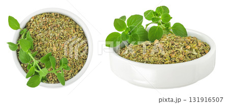 Oregano or marjoram leaves fresh and dry in ceramic bowl isolated on white background. Top view. Flat lay Oregano or marjoram leaves fresh and dry in ceramic bowl isolated on white background. Top view. Flat lay 131916507