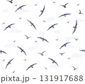 Seamless pattern with birds flying in the sky with clouds over sea waves. Nature sea view ornamental line drawn background 131917688