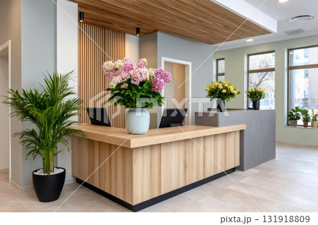 Modern office reception desk with plants and flowers 131918809
