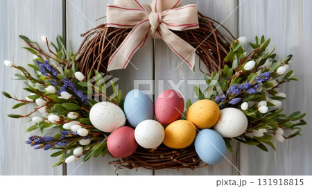 Easter egg wreath decorating rustic wooden door for spring celebration 131918815