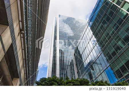 Modern glass skyscrapers in financial district, low angle city architecture perspective 131919040