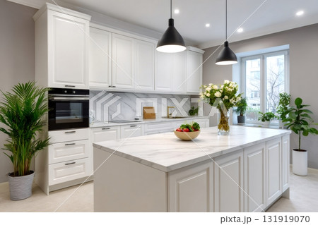 Modern kitchen interior with white marble island 131919070