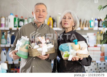 Elderly couple choosing shower gift sets together Elderly couple choosing shower gift sets together 131919579