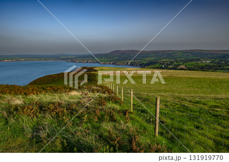 Coastal Path At The Wild Atlantic Coast Of Dinas Head In Pembrokeshire In Wales, United Kingdom Coastal Path At The Wild Atlantic Coast Of Dinas Head In Pembrokeshire In Wales, United Kingdom 131919770