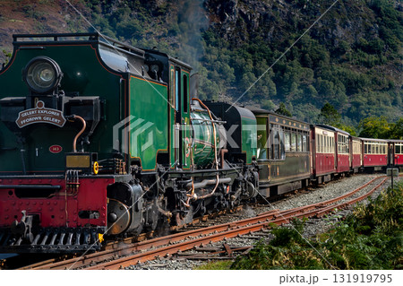 Old Train With Steam Locomotive At Beddgelert Train Station In Snowdonia National Park In Wales, United Kingdom Old Train With Steam Locomotive At Beddgelert Train Station In Snowdonia National Park In Wales, United Kingdom 131919795
