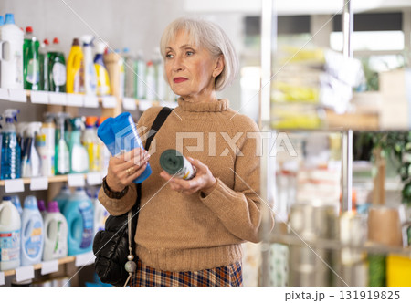 customer chooses garbage bags 131919825