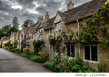 Picturesque Village Castle Combe In The Cotswolds Area In Wiltshire In England, United Kingdom Picturesque Village Castle Combe In The Cotswolds Area In Wiltshire In England, United Kingdom 131919985