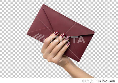 Elegant hand with glossy burgundy nails holding matching burgundy envelope, invitation or wedding concept isolated on transparent background 131921380