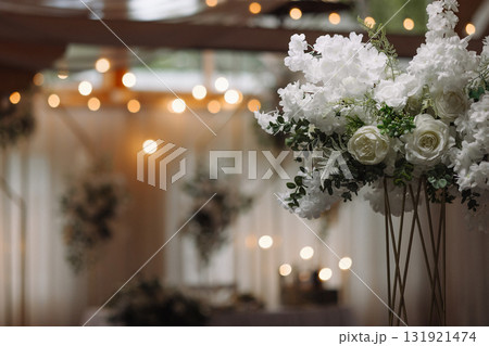 White wedding flowers with blurred lights background and copy space 131921474
