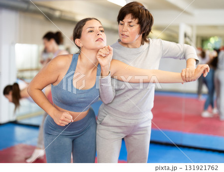 Women and girls in self-defense class Women and girls in self-defense class 131921762