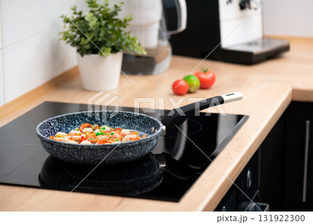 Cooking fresh vegetables in a pan Cooking fresh vegetables in a pan 131922300
