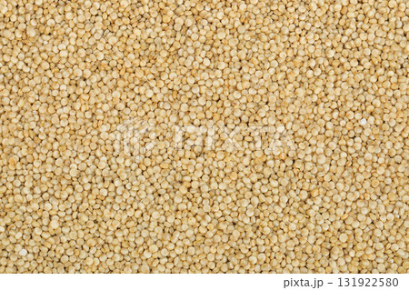 white quinoa seeds as a background. Top view. Flat lay white quinoa seeds as a background. Top view. Flat lay 131922580