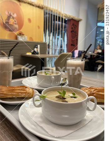 cheese soup on a tray in a cafe 131923457