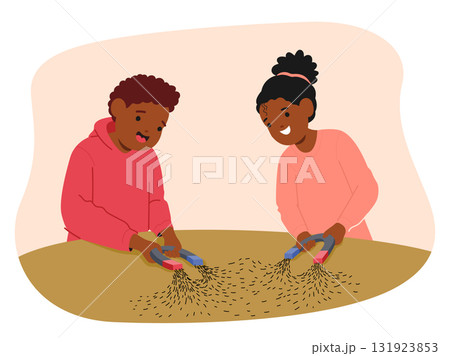 Girl and boy classmates studying magnetic field lines during physics science lesson at school scene 131923853